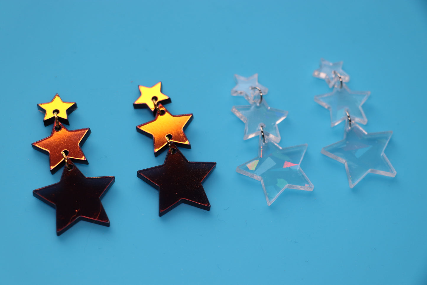 Multidimensional iridescent acrylic star earrings